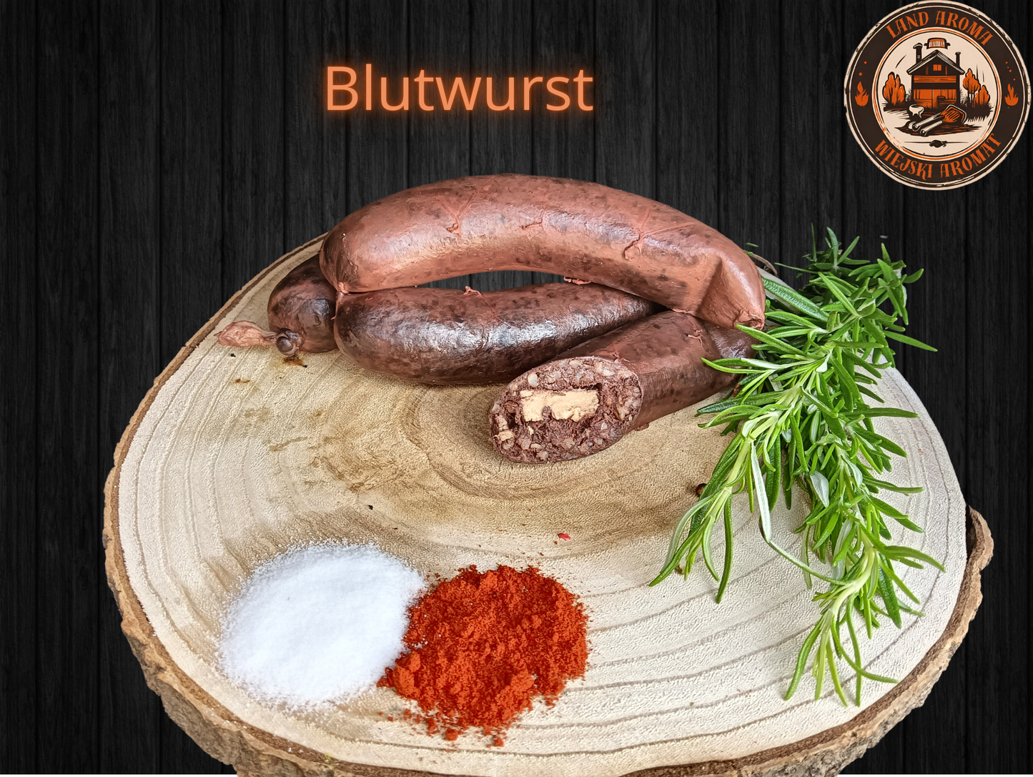Rustic Blutwurst on wooden board with spices and rosemary, part of the 10 kg Königliche Box.